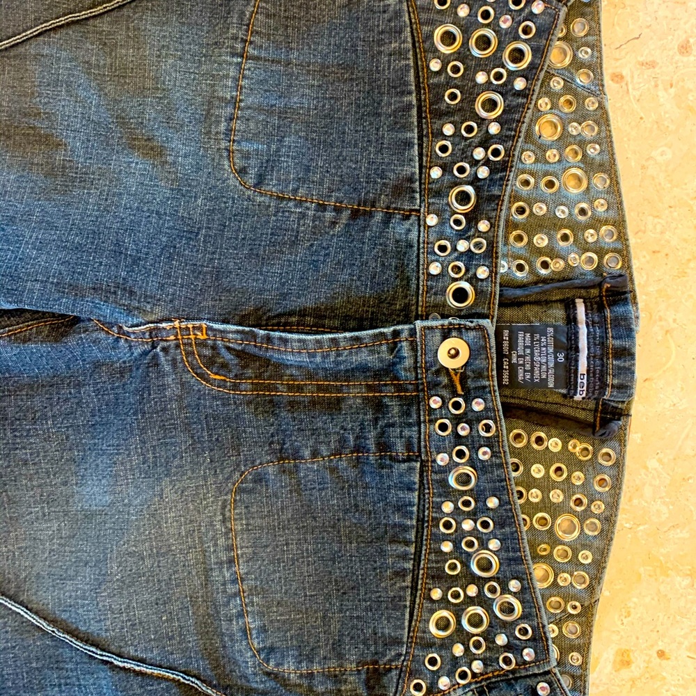 Bebe jeans with leather lace up